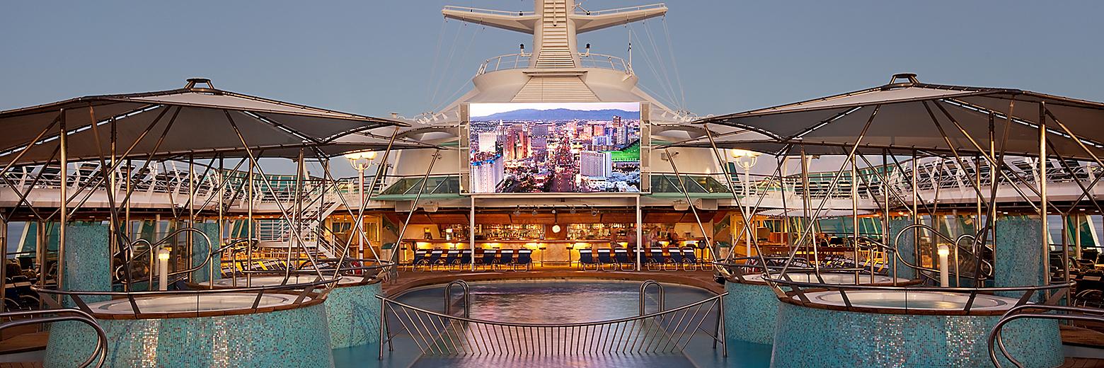 rhapsody-outdoor-movie-screen-pool-deck-sunset-activity