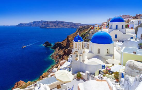 Classic white and blue houses of Oia in Santorini, Greece